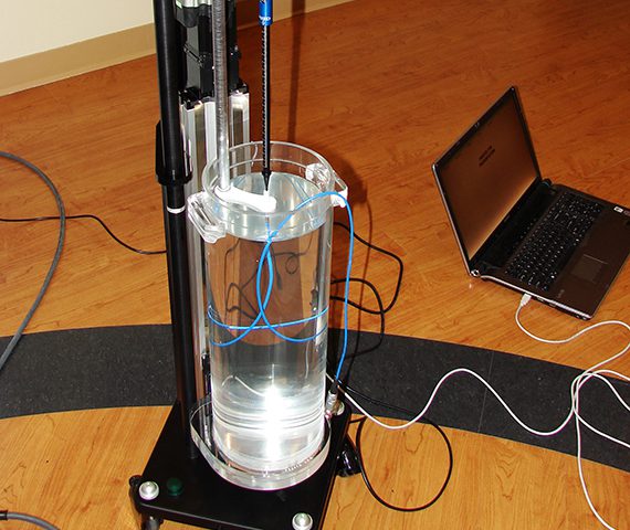 Radiation calibration fixture with clear tank